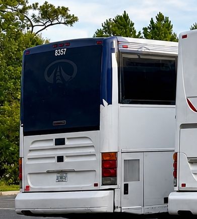 Welcome Transportation Bus 18, white and navy motorcoach