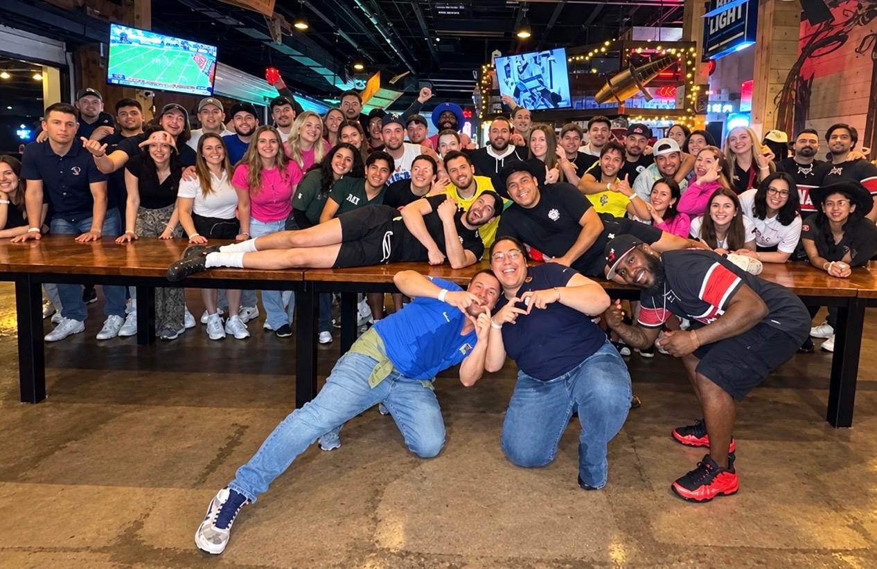 A group of riders posing together after a night out