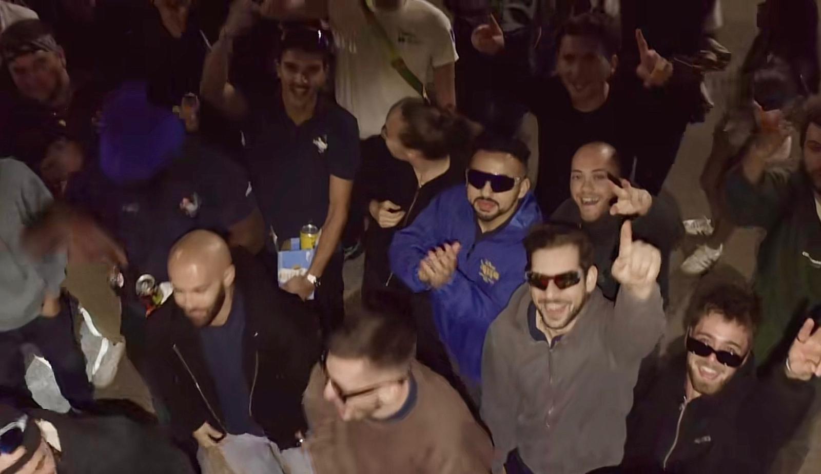 Crowd cheering on a Happy Tuesdays night out